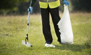 person-doing-community-service-by-collecting-trash